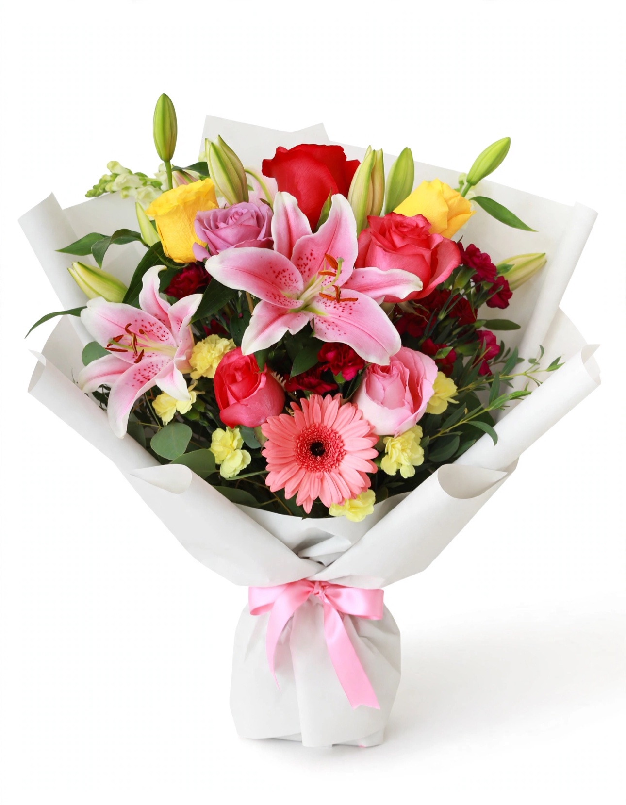 Style example for The Signature — a colorful mixed bouquet of pink lilies, roses, and gerbera daisies in white wrap tied with a pink bow
